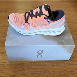 On Cloudsurfer 2. Tangerine/Ivory